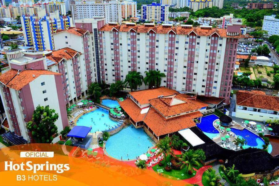 an aerial view of a resort with two swimming pools at Hotel Hot Springs 528 in Caldas Novas