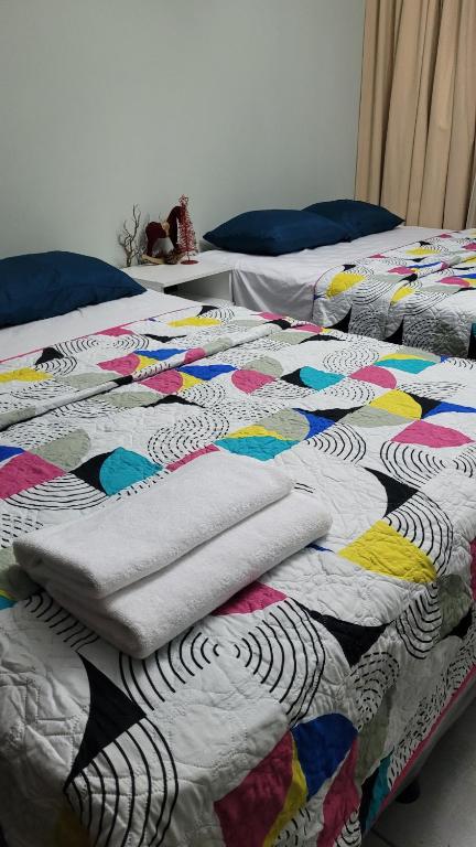 Postel nebo postele na pokoji v ubytování aparhotel 1309