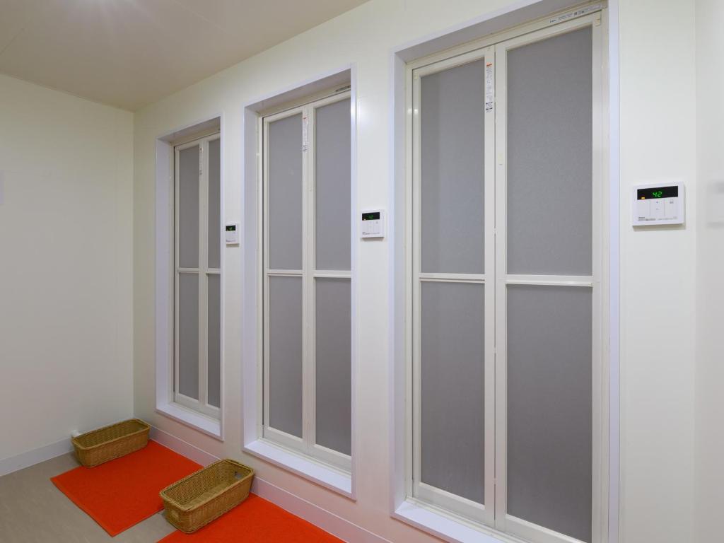 Fotografie z fotogalerie ubytování Tabist カプセルイン笠懸 男性専用 Tabist Capsule Inn Kasakake Male Only v destinaci Midori