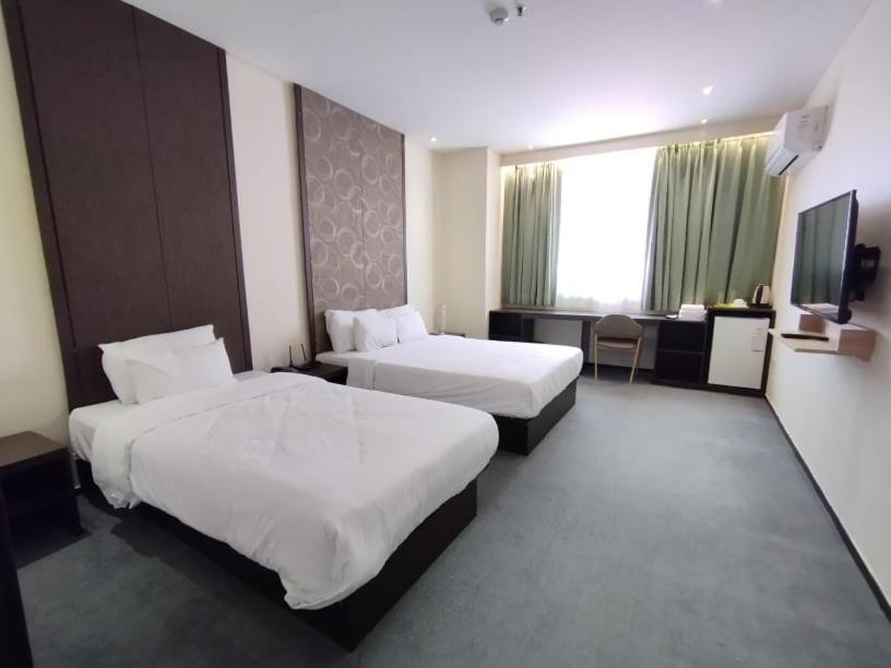 Postel nebo postele na pokoji v ubytování On Hotel
