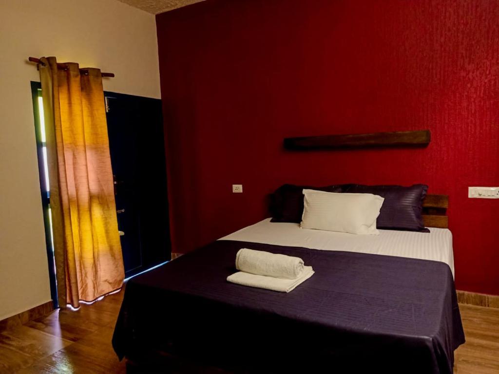 Postel nebo postele na pokoji v ubytování Urban Cliff Resort