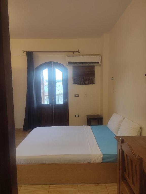 Letto o letti in una camera di Habibi Nubian Guest House-Nubian Hospitality