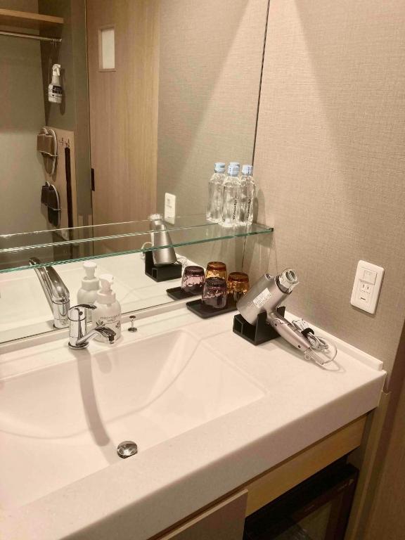 Koupelna v ubytování Dormy Inn Premium Ginza