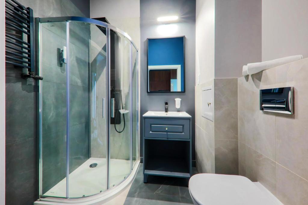Kúpeľňa v ubytovaní Aparthotel Cracovia Residence