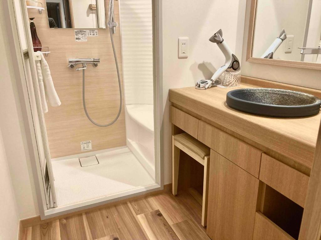 Koupelna v ubytování Dormy Inn Premium Ginza