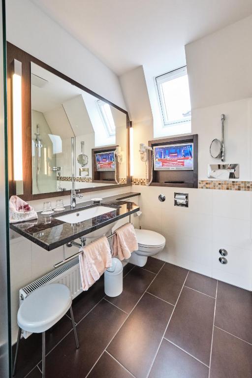 Ein Badezimmer in der Unterkunft Hotel Haus Berlin