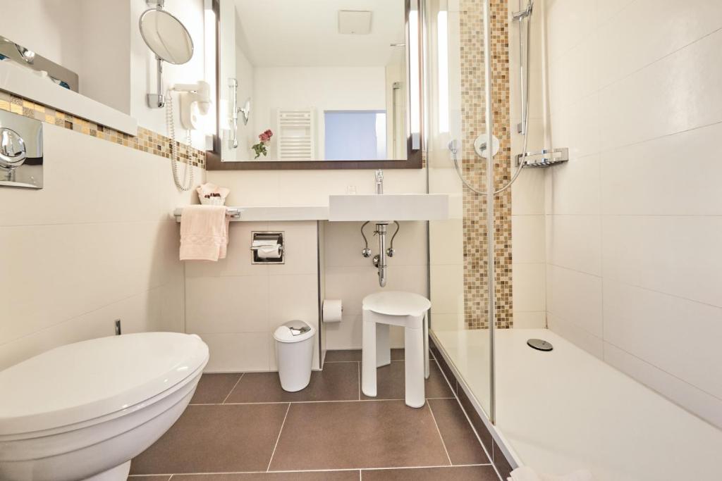 Ein Badezimmer in der Unterkunft Hotel Haus Berlin