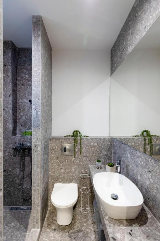 Kúpeľňa v ubytovaní TwinStars Superior Apartment