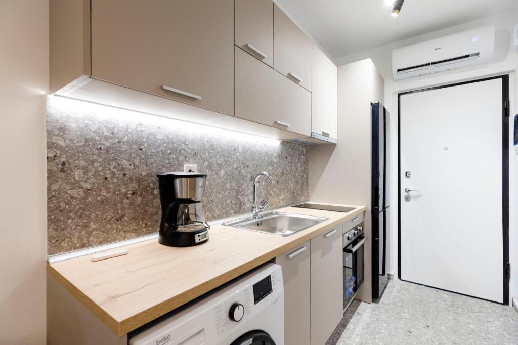 Kuchyňa alebo kuchynka v ubytovaní TwinStars Superior Apartment