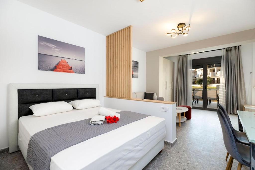 Posteľ alebo postele v izbe v ubytovaní TwinStars Superior Apartment
