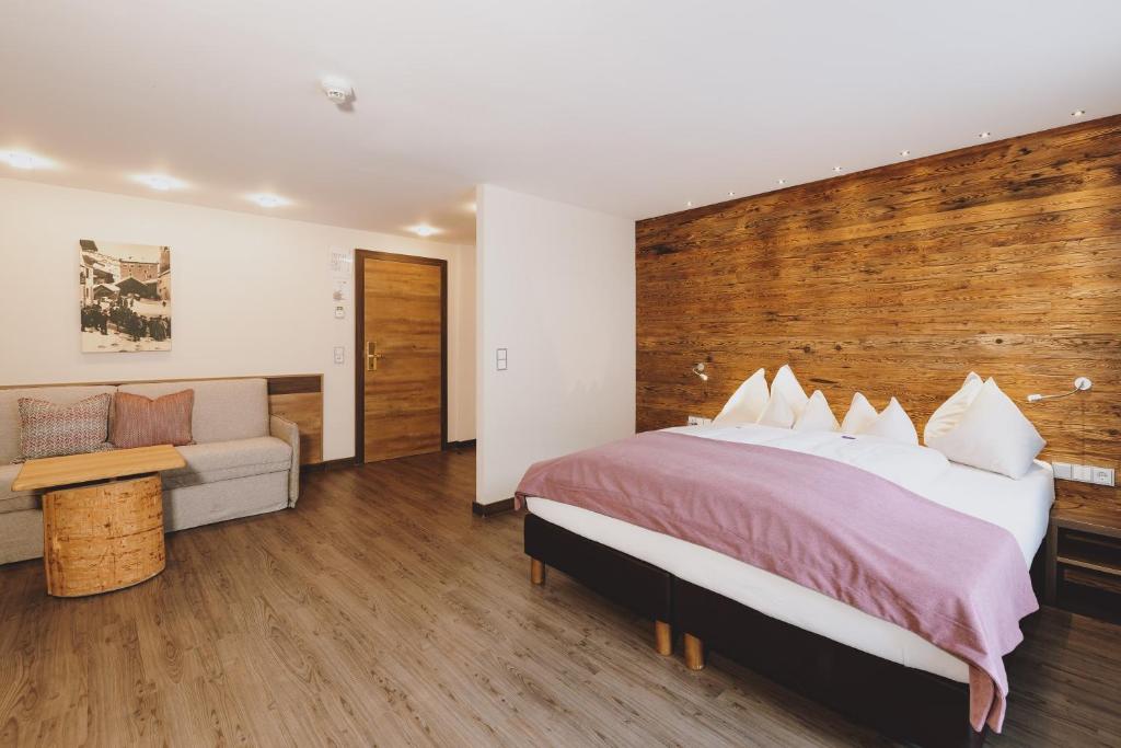 Postel nebo postele na pokoji v ubytování Hotel DIE SONNE