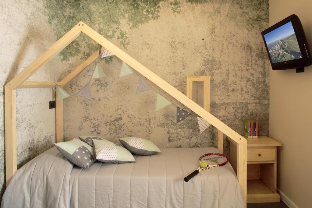 Postel nebo postele na pokoji v ubytování Hotel Porta Nuova