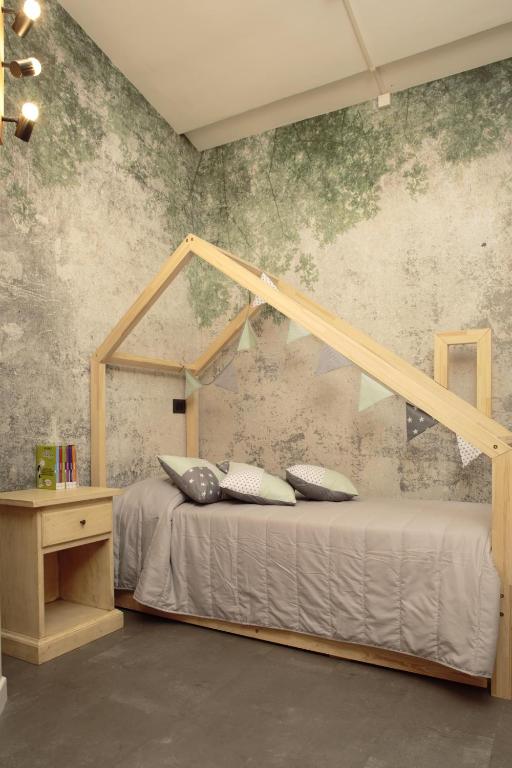 Postel nebo postele na pokoji v ubytování Hotel Porta Nuova