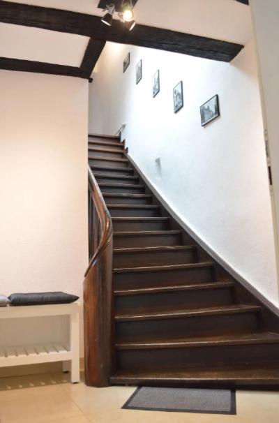 a staircase in a building with a stair case at Bretzel &amp; Raisin - Hypercentre de Colmar in Colmar