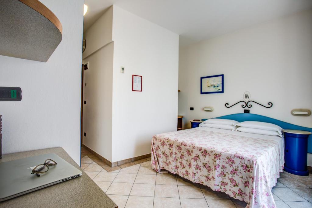 Postel nebo postele na pokoji v ubytování Ancora Hotel & Residence