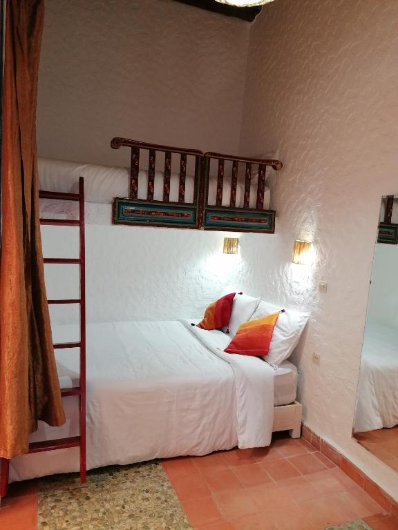 Postel nebo postele na pokoji v ubytování DAR MAR'OUKA , Maison d'hôtes