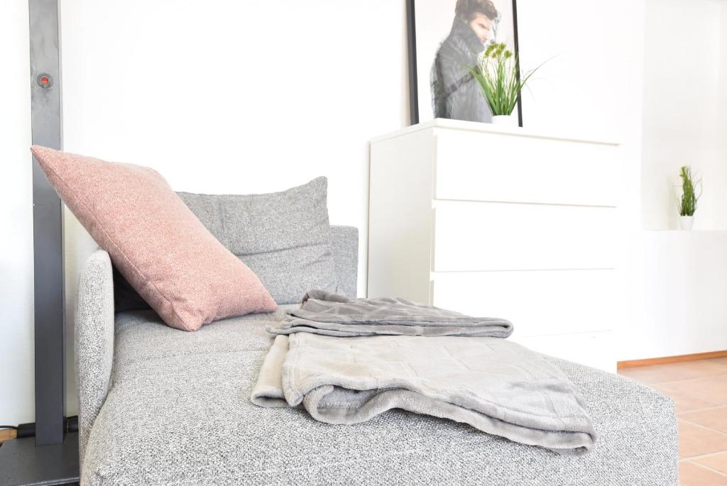 Ένα ή περισσότερα κρεβάτια σε δωμάτιο στο Big Wilten Apartment with free parking- Central and Peaceful