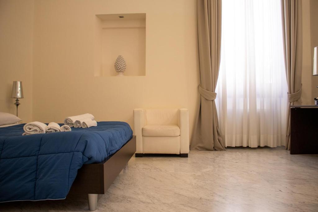 Postel nebo postele na pokoji v ubytování Apollo Suites