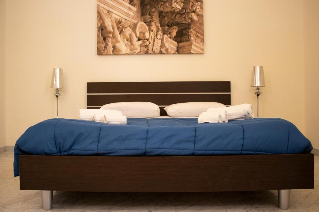 Postel nebo postele na pokoji v ubytování Apollo Suites