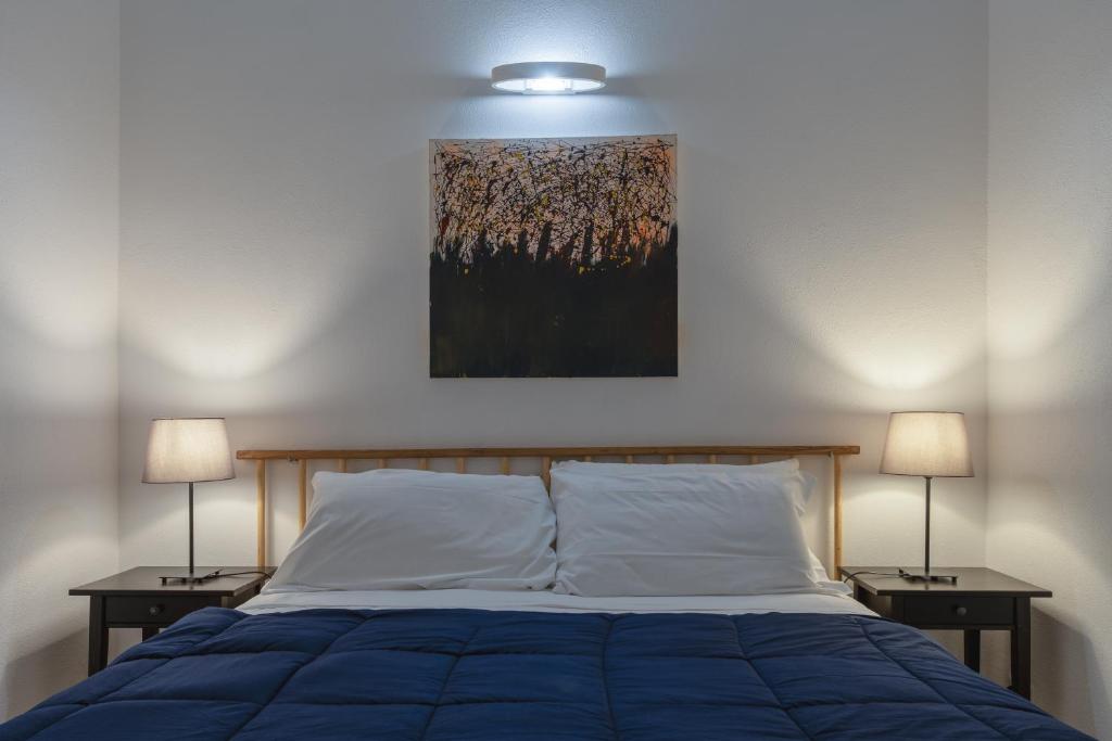 Postel nebo postele na pokoji v ubytování Dalmati House San Lorenzo