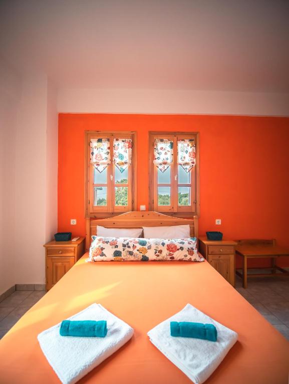 Posteľ alebo postele v izbe v ubytovaní Orange House for big families in Damouchari - Delicious Houses