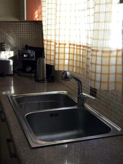 A kitchen or kitchenette at Casa Karavola in Galanado village-Naxos