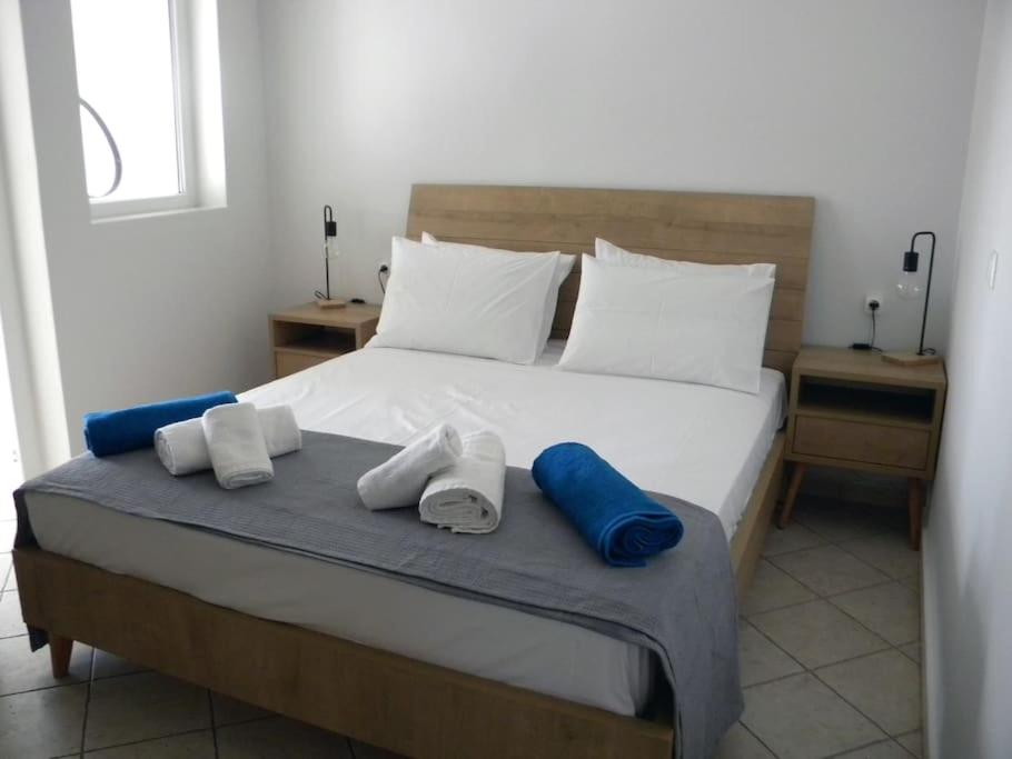 A bed or beds in a room at Casa Karavola in Galanado village-Naxos