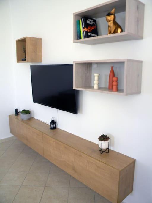 A television and/or entertainment centre at Casa Karavola in Galanado village-Naxos