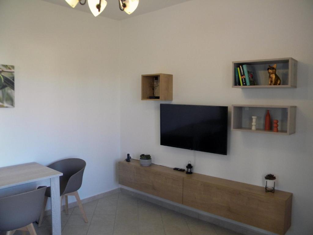 A television and/or entertainment centre at Casa Karavola in Galanado village-Naxos
