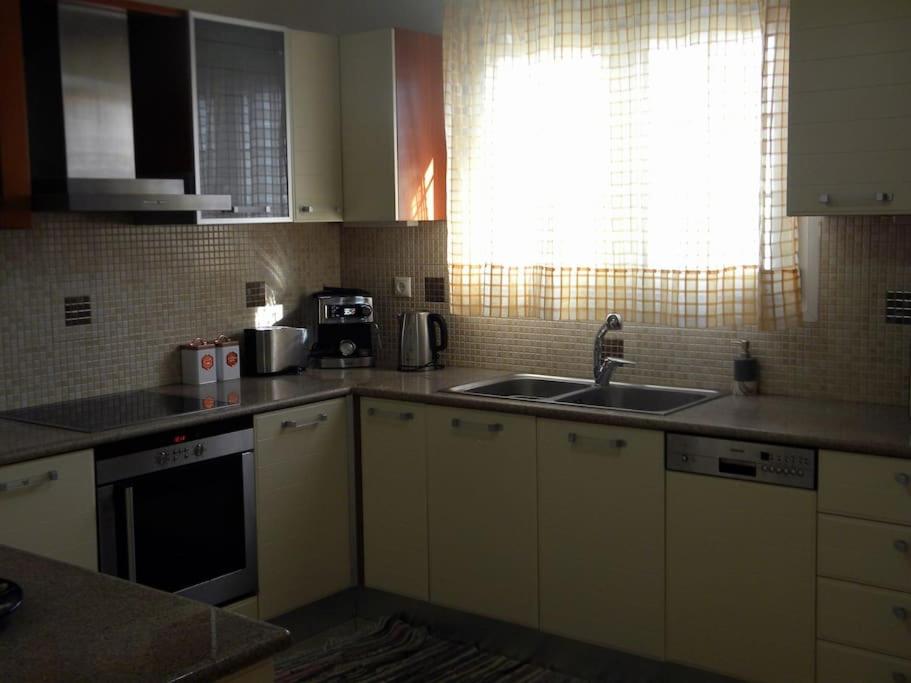 A kitchen or kitchenette at Casa Karavola in Galanado village-Naxos