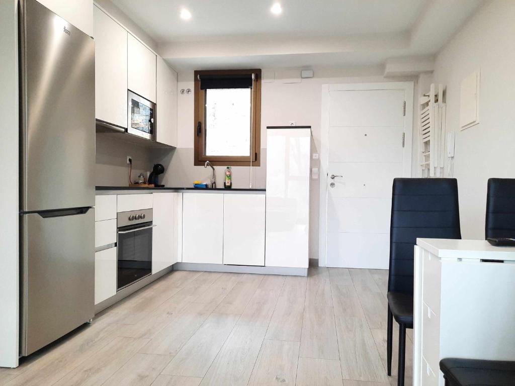 Kuchyň nebo kuchyňský kout v ubytování Apartamentos Ordesa Ainsa