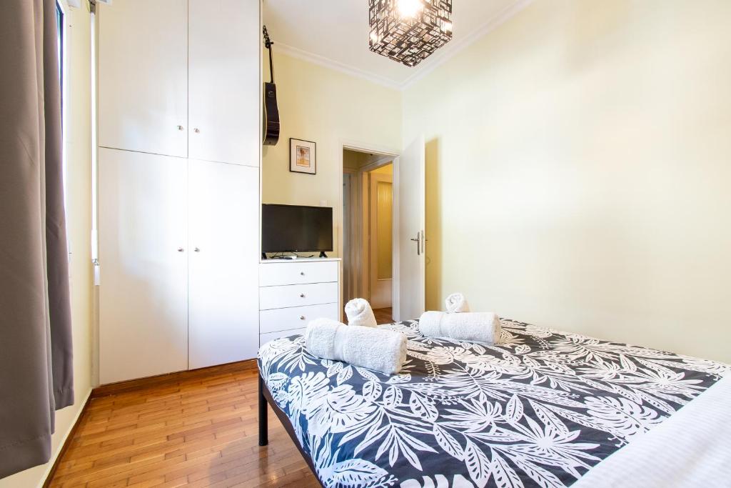 Posteľ alebo postele v izbe v ubytovaní The Gallery Apartment