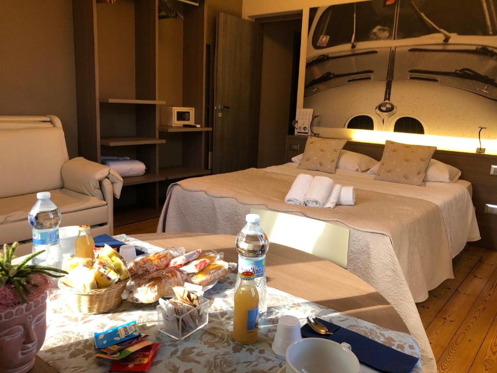 Posteľ alebo postele v izbe v ubytovaní International Rooms & Apartments