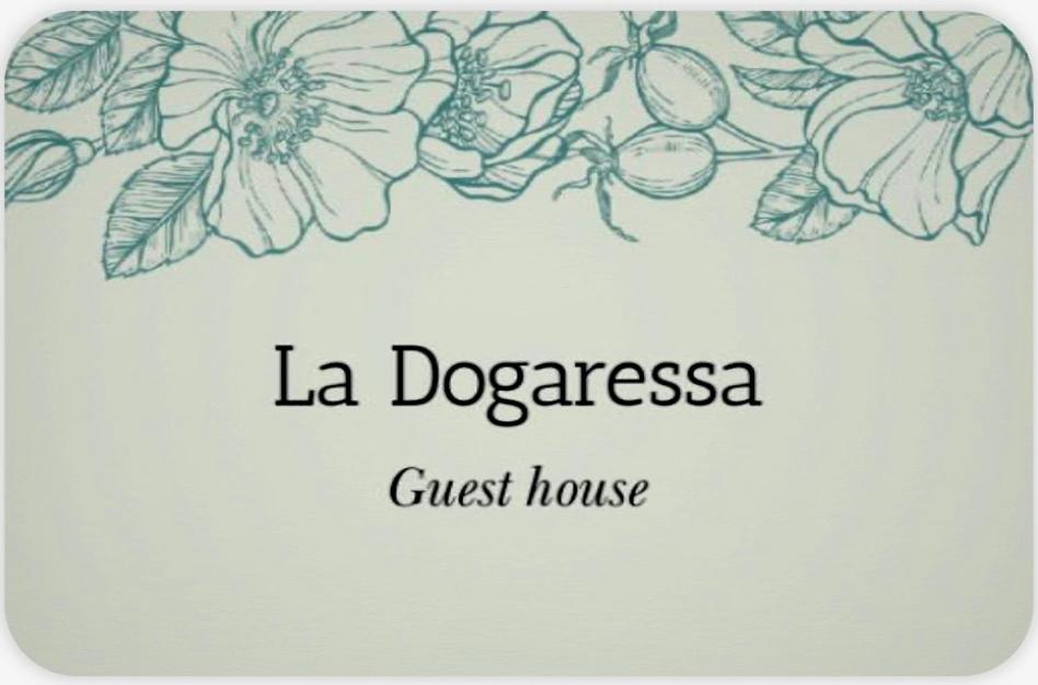 a drawing of a guest house with flowers at La Dogaressa Guest House in Venice