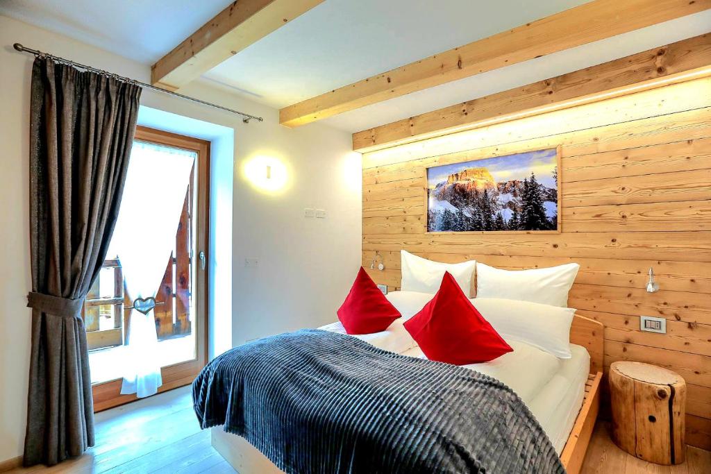 Posteľ alebo postele v izbe v ubytovaní Chalet Tobià