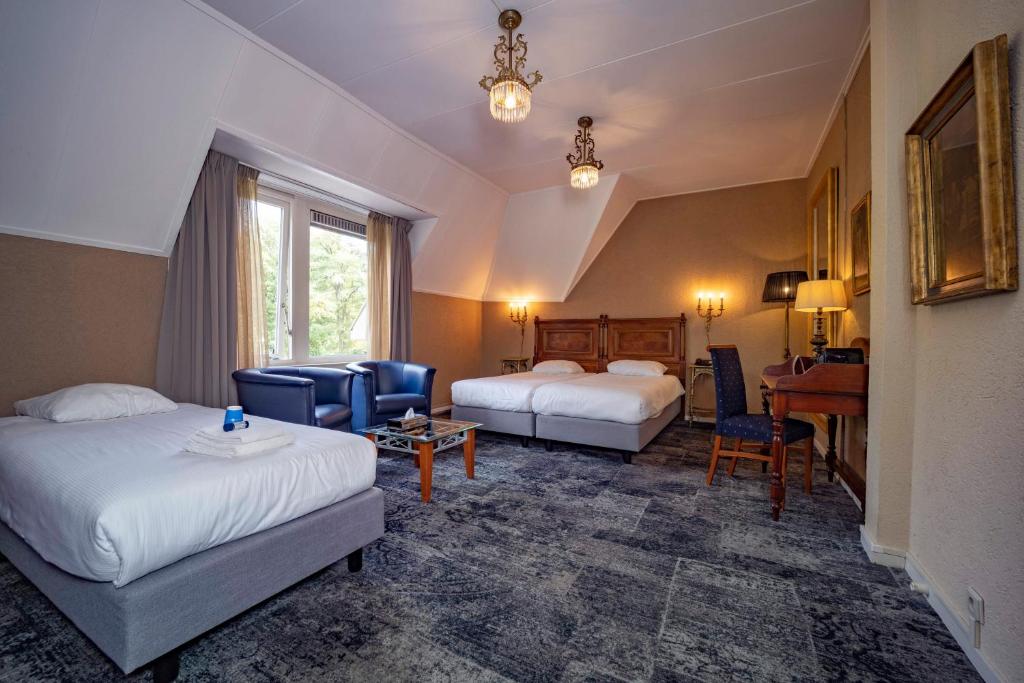 Postel nebo postele na pokoji v ubytování Fletcher Hotel Apeldoorn