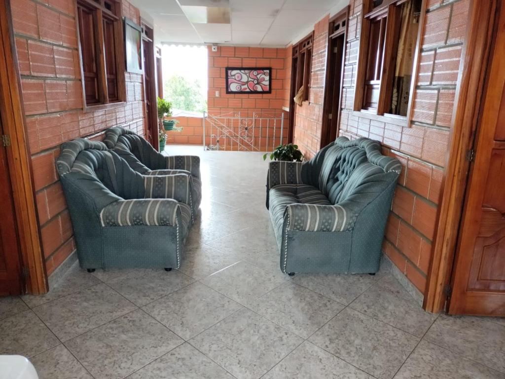 Posezení v ubytování Casa Hotel Los Faroles- Samaná/Caldas