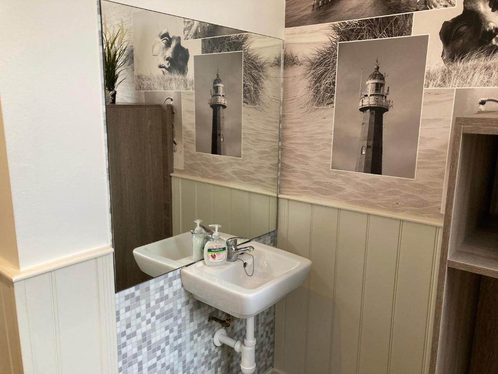 Koupelna v ubytování Hotel Poseidon