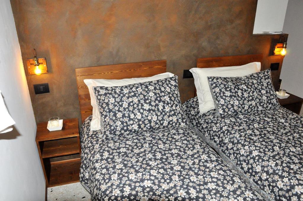 Postel nebo postele na pokoji v ubytování NAZIONALE Camere