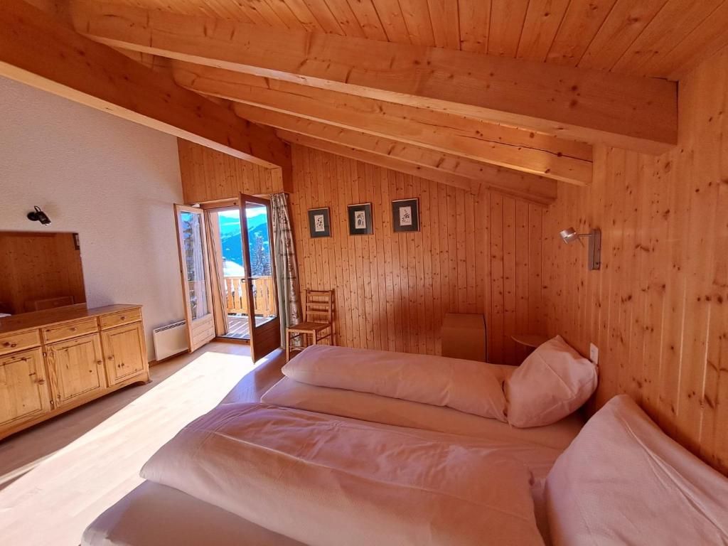 Postel nebo postele na pokoji v ubytování Apartment Baudrier A28 by Interhome