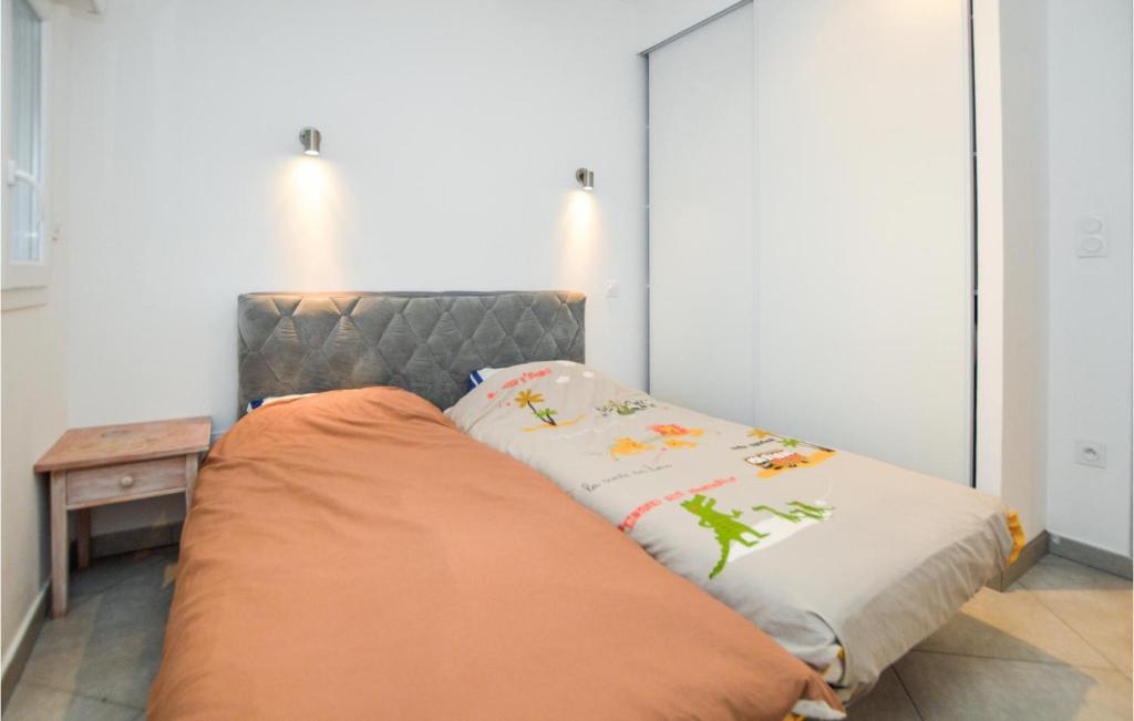 Posteľ alebo postele v izbe v ubytovaní Lovely Apartment In Ghisonaccia