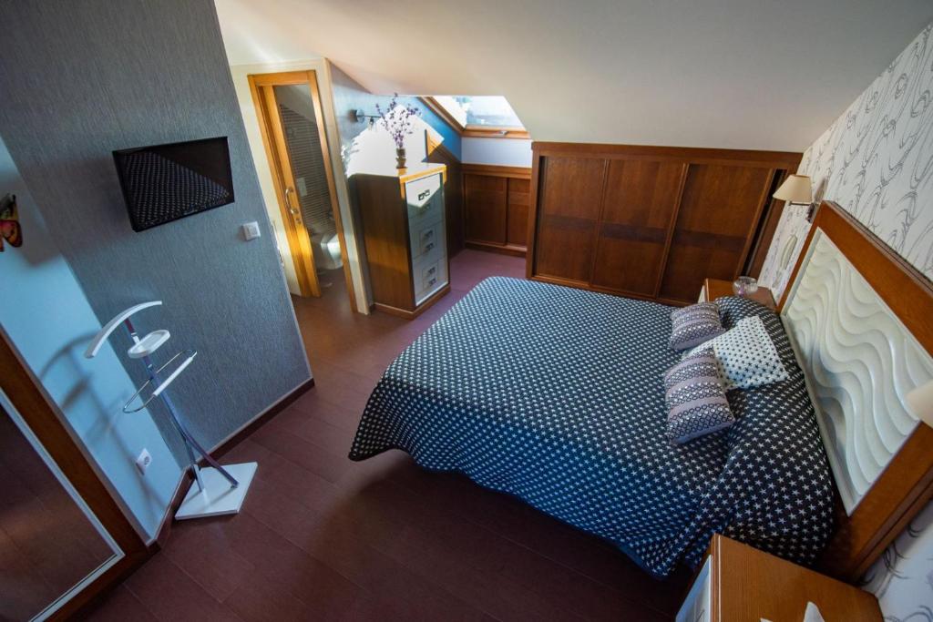 Łóżko lub łóżka w pokoju w obiekcie CASA LELA