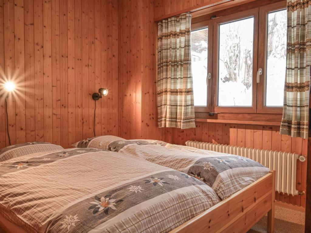 Postel nebo postele na pokoji v ubytování Apartment Dent Favre A 5 by Interhome
