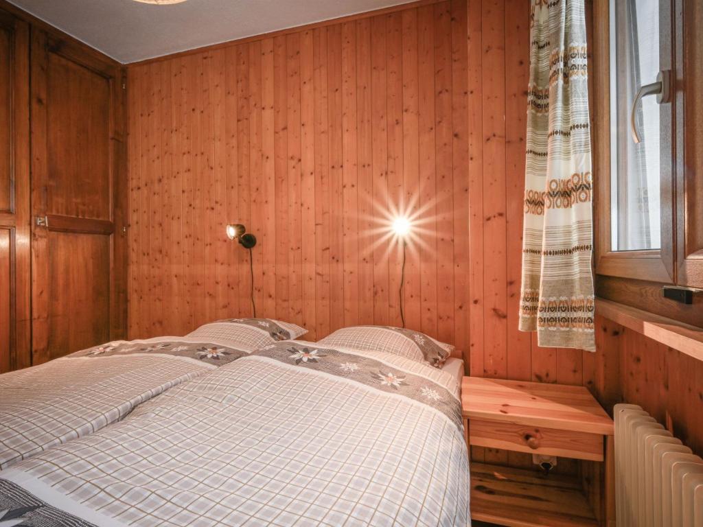 Postel nebo postele na pokoji v ubytování Apartment Dent Favre A 5 by Interhome