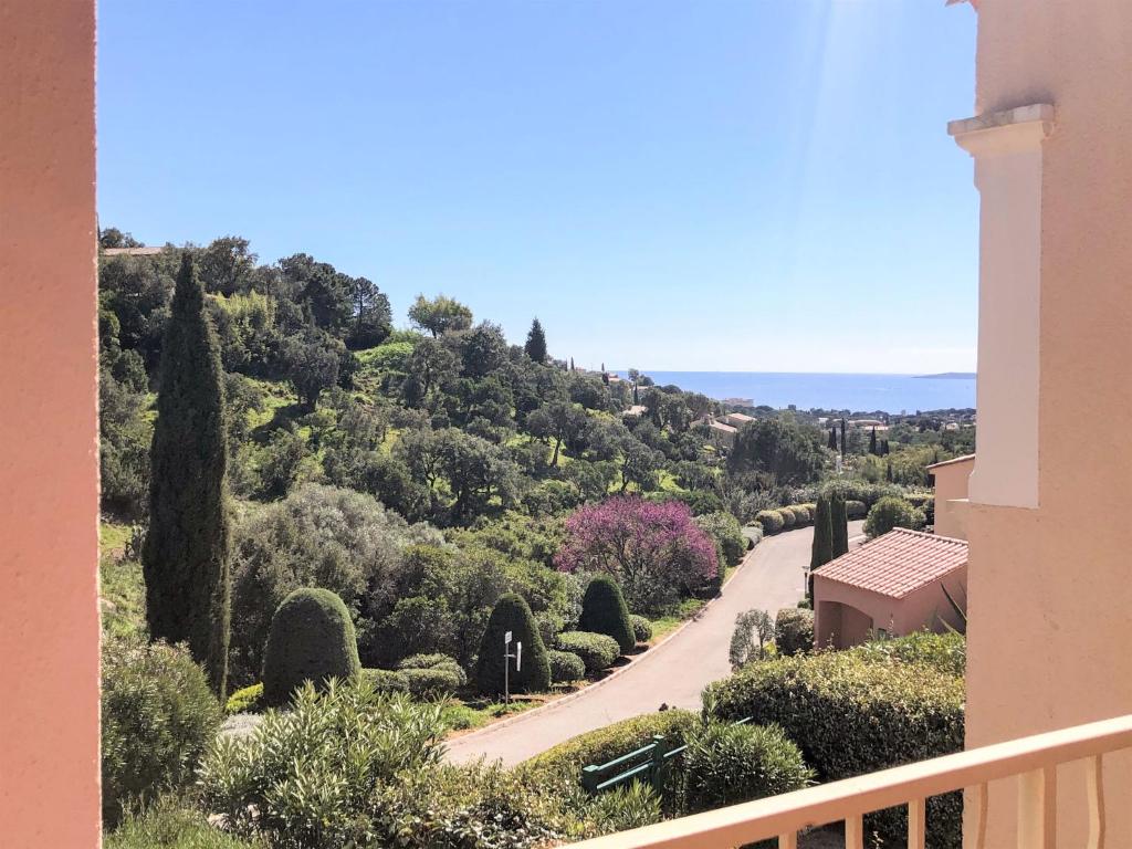 a view from the balcony of a house at Apartment Les Hauts des Issambres-8 by Interhome in La Garonnette-Plage