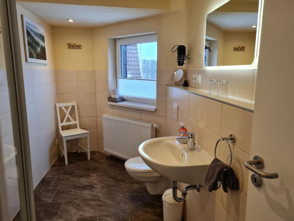 Koupelna v ubytování Harz Pension