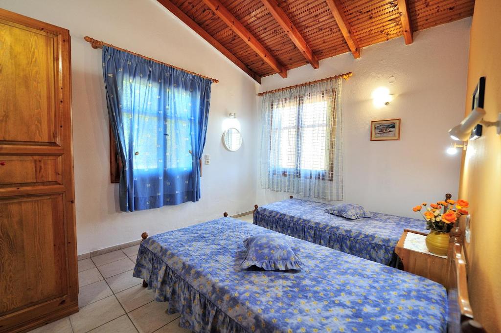 Postel nebo postele na pokoji v ubytování Anastazia Paradise
