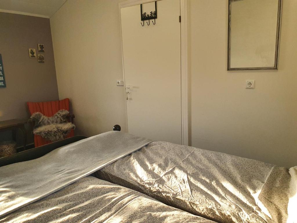 Postel nebo postele na pokoji v ubytování Tjörn