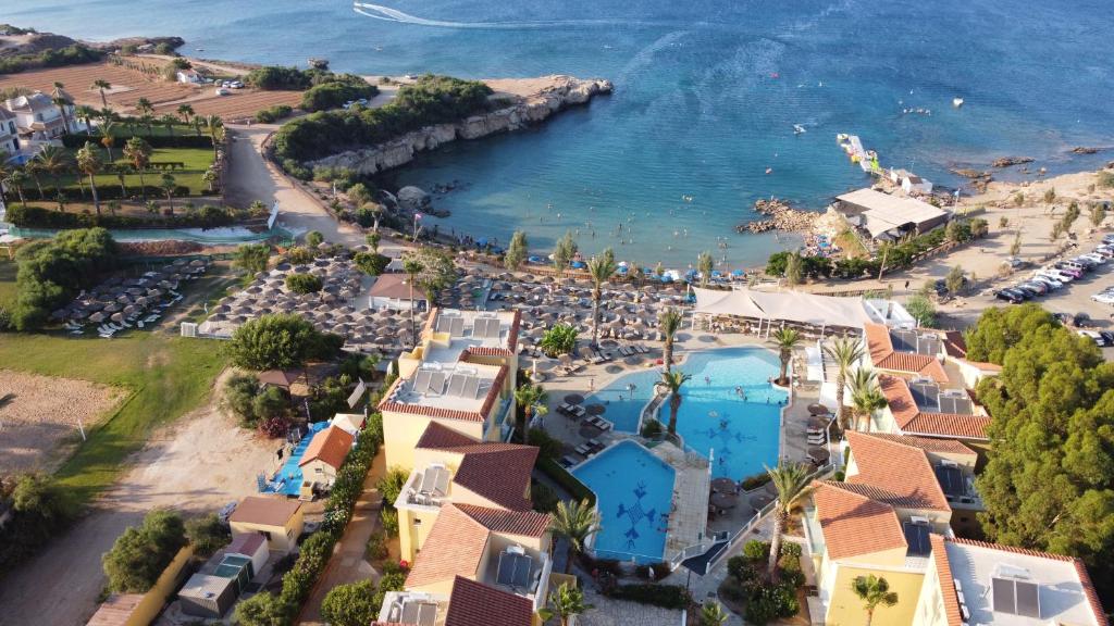 an aerial view of the resort and the ocean at Malama Beach Holiday Village in Protaras