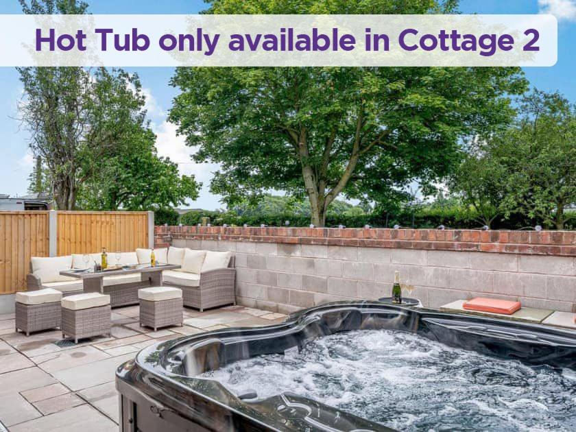 a hot tub only available in a yard at The Cottages at Ivy Farm by Charles Alexander Short Stay in Lytham St Annes